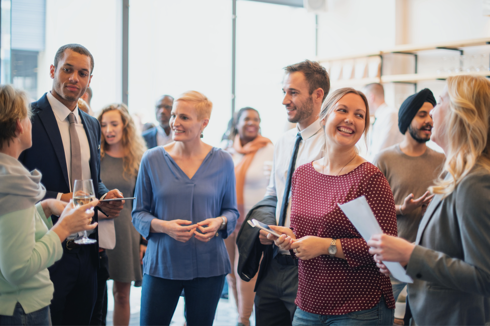 Diverse alumni networking at an event