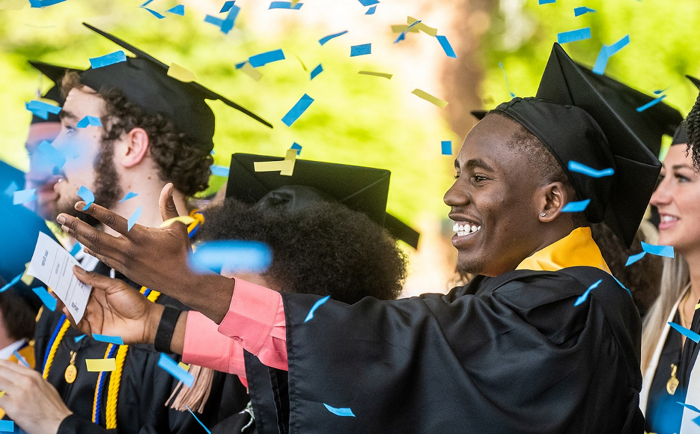 Graduates celebrating at commencement ceremony